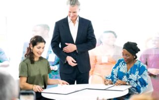 A photo shows California Governor Gavin Newsom and the Director General of Nigeria’s National Council on Climate Change, Dahiru Salisu Tenioye, signing a Memorandum of Understanding.